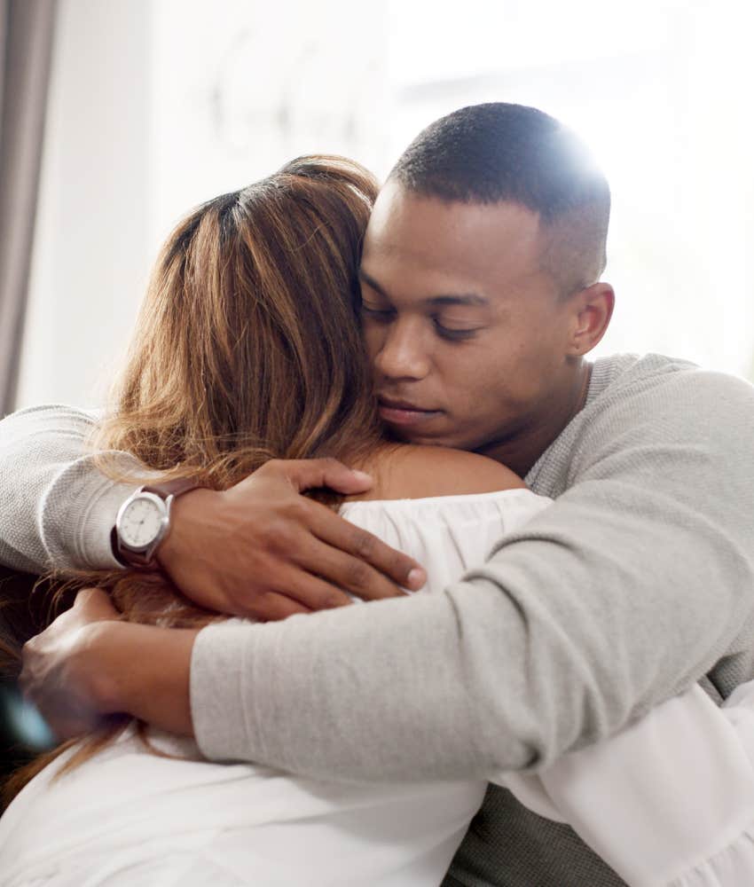 Hugging couple know love is never perfect