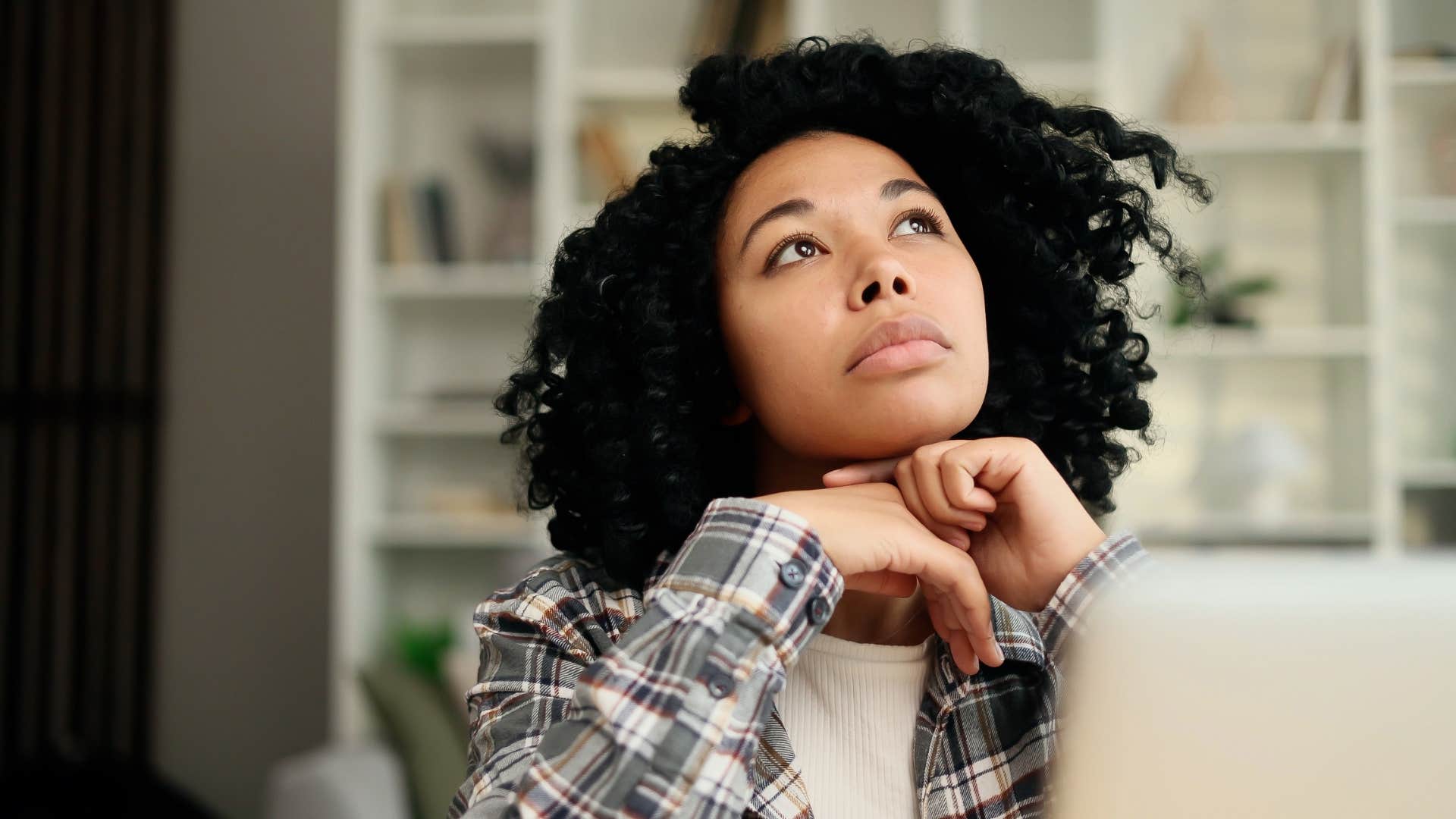 woman thinking as her creativity spikes
