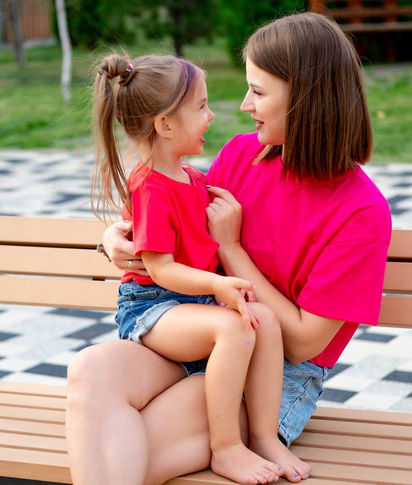 Happy kid talks with present parent