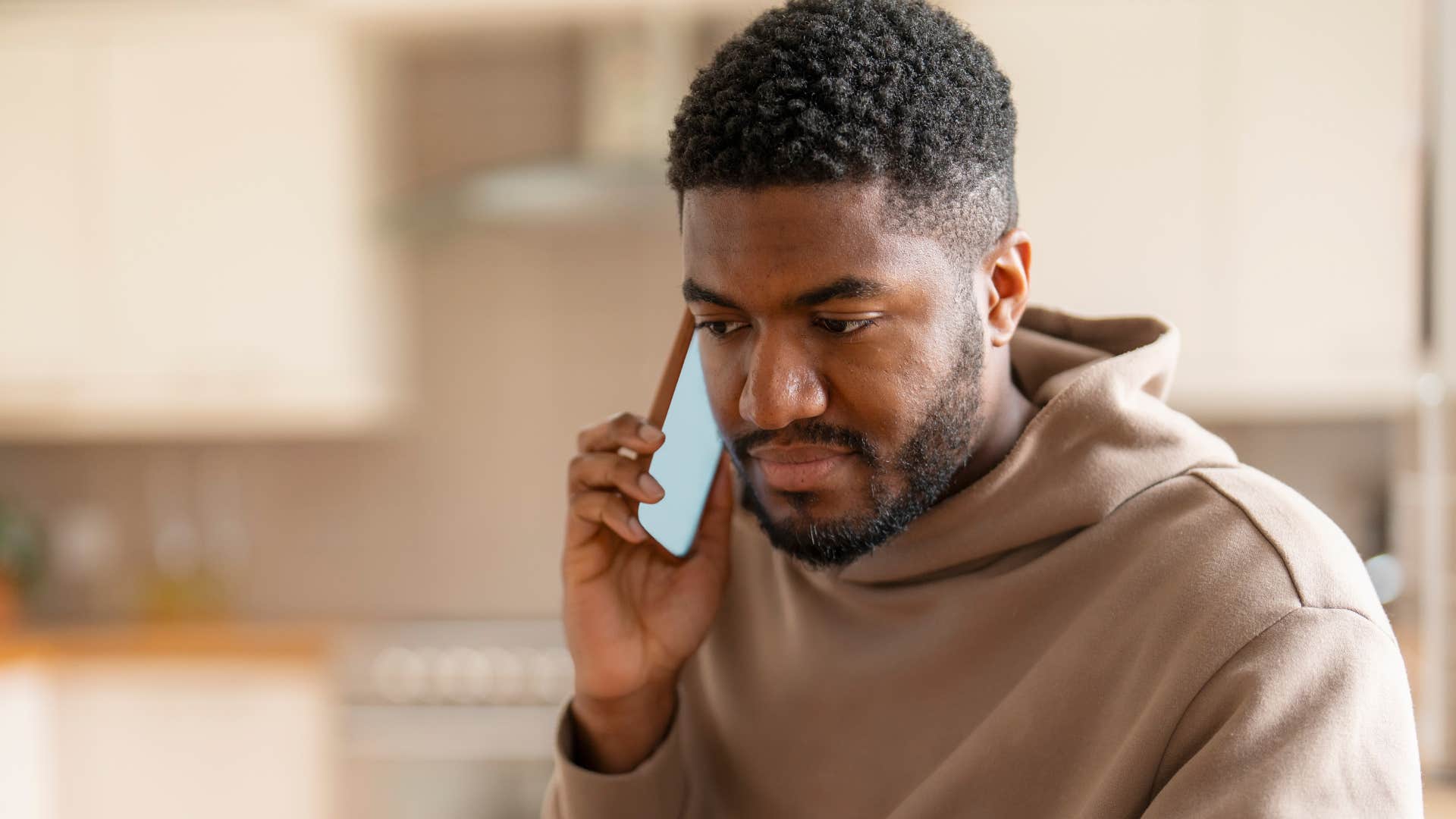 exhausting man on the phone saying can we just move on