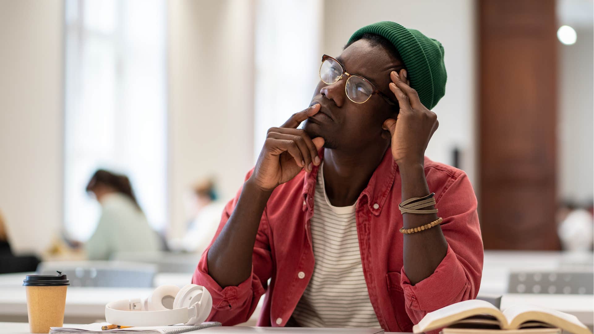 Imaginative person thinking deeply showing habit to find good