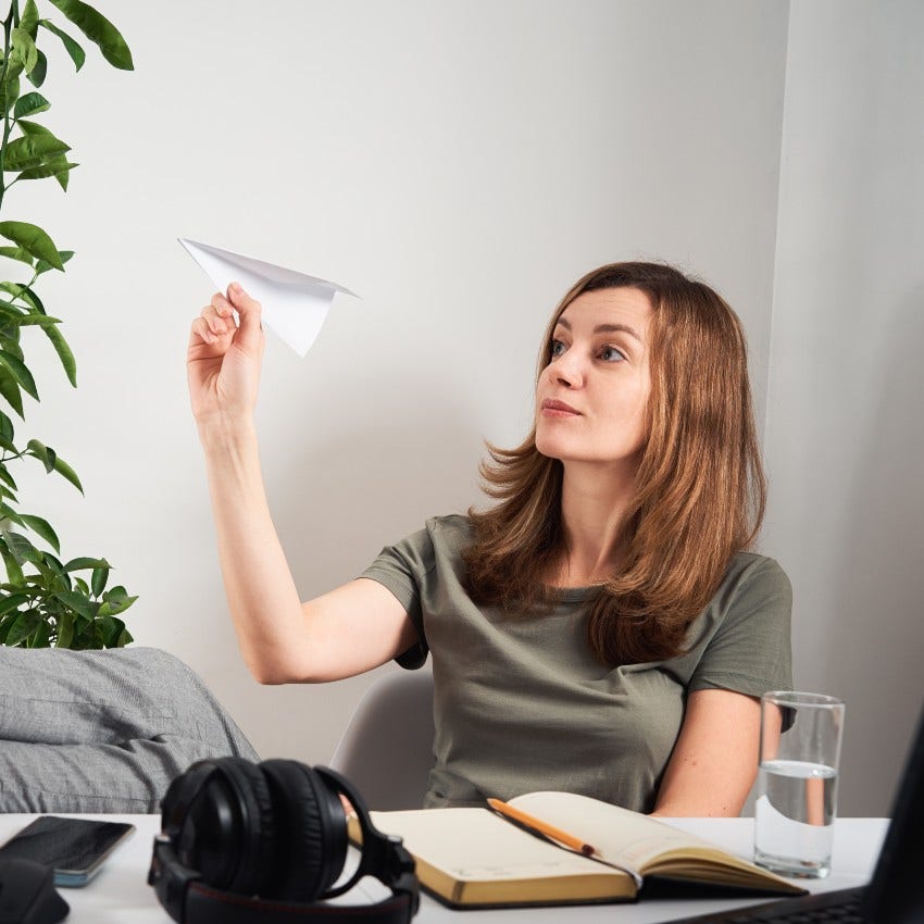 woman who is procrastinating that is hurting her chance at a promotion