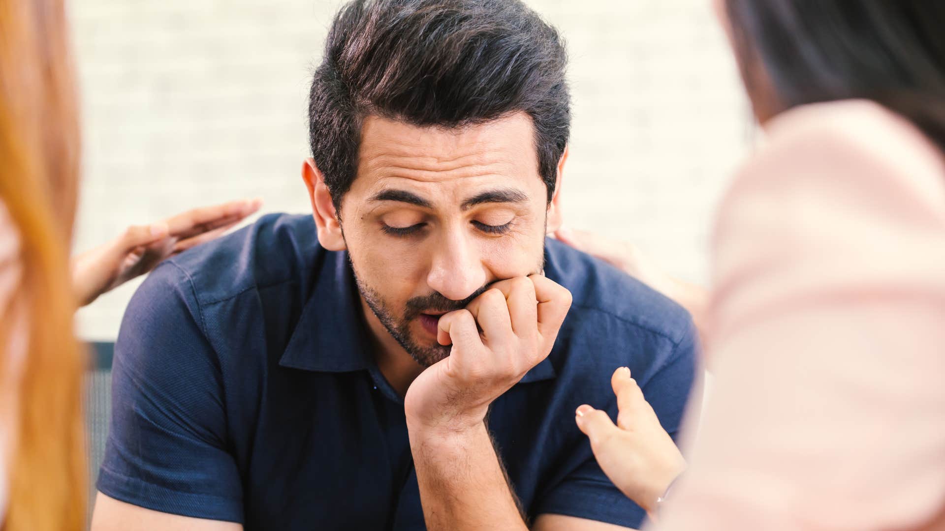 man seeking validation from others being comforted