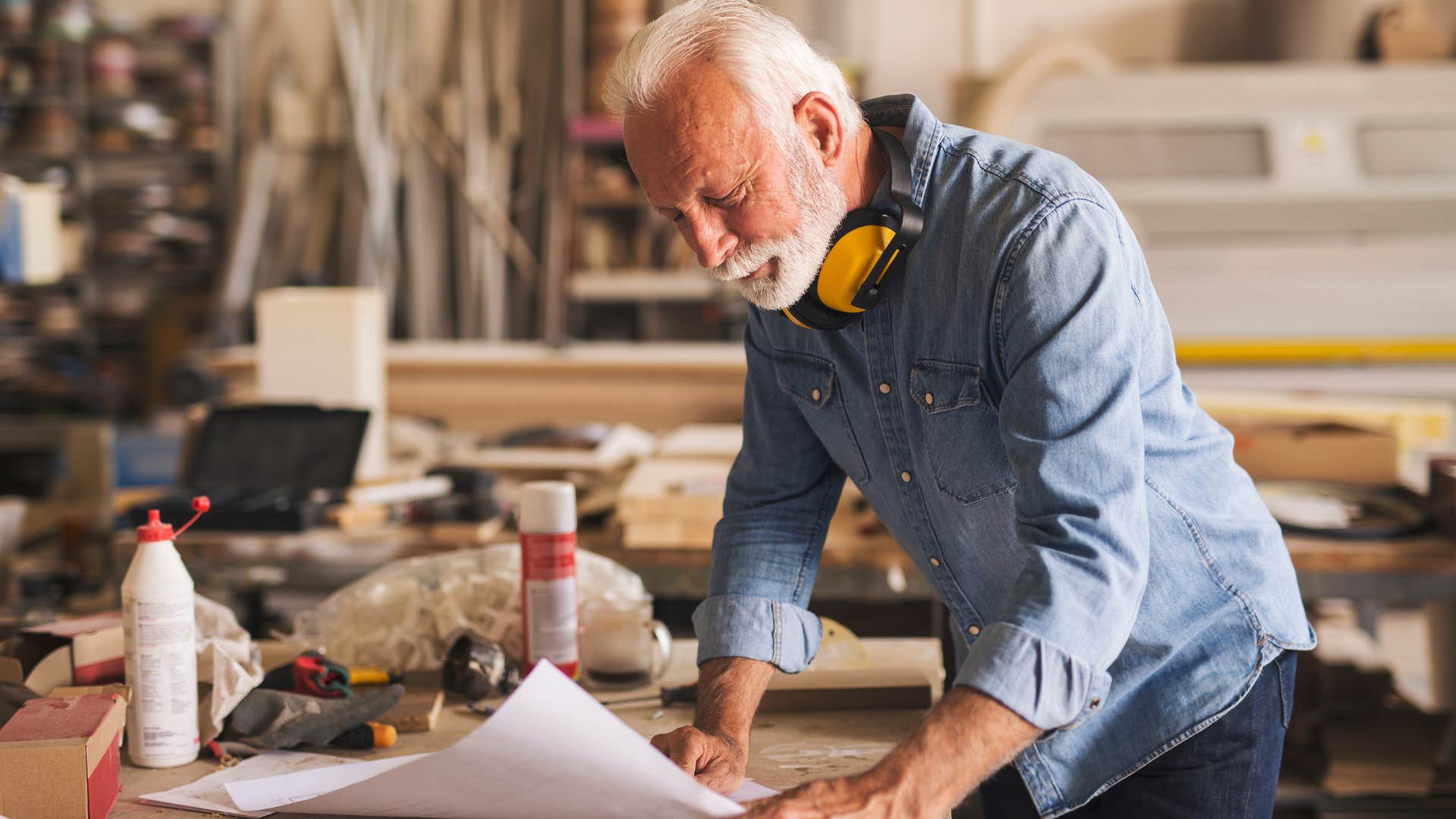 Man who spends more time alone working in his garage.