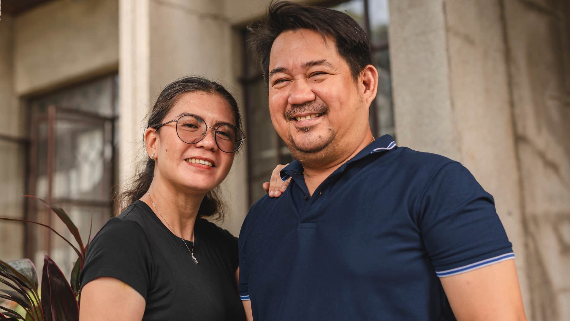 man who knows how to support his partner standing next to her