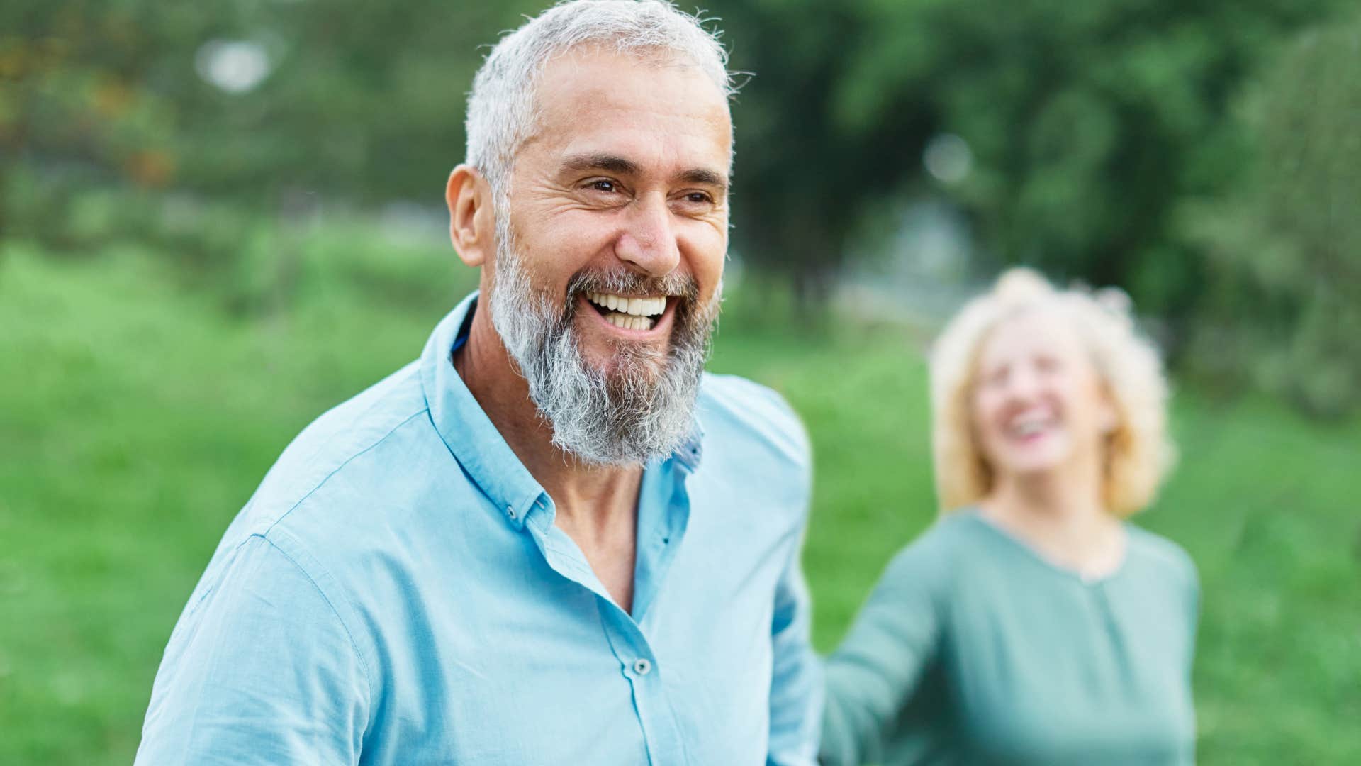older couple who rediscovered each other walking outside