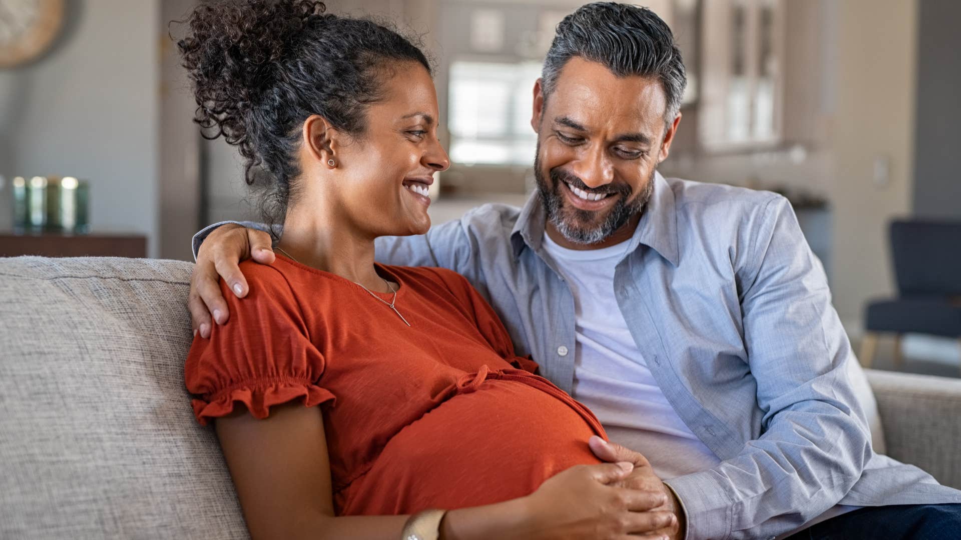 couple who shares the same values sitting on the couch together