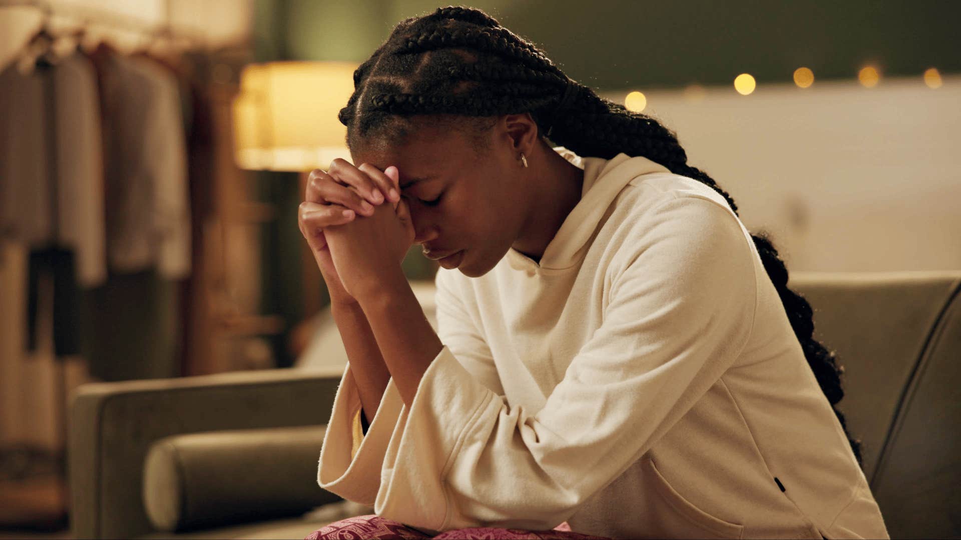 woman praying asking for help from her higher power