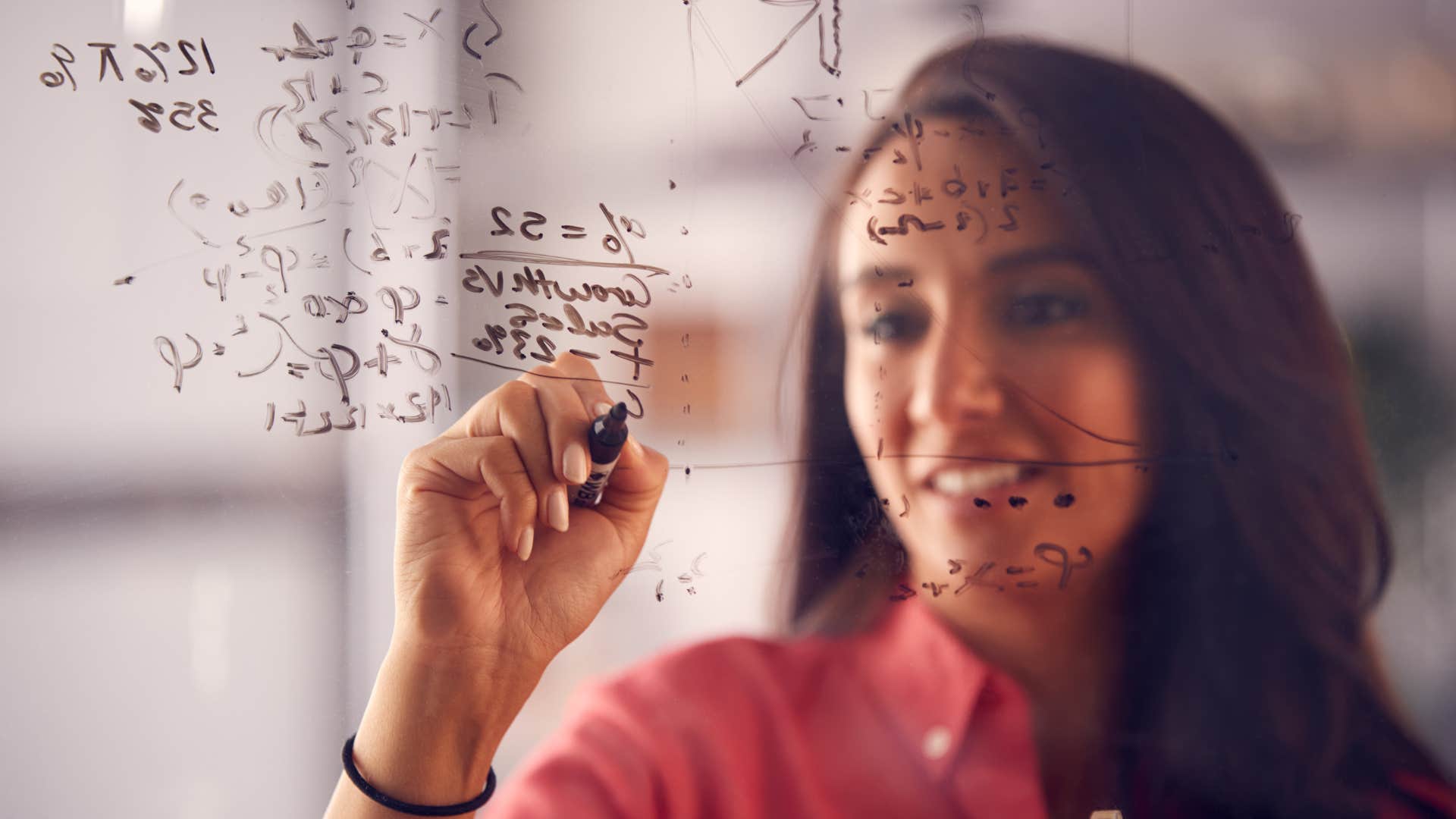 woman whose mind works fast doing math problems