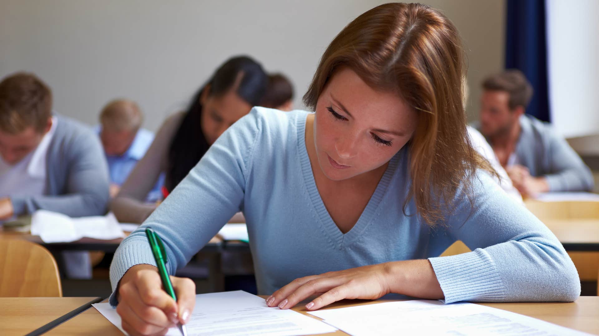 woman taking a test and excelling