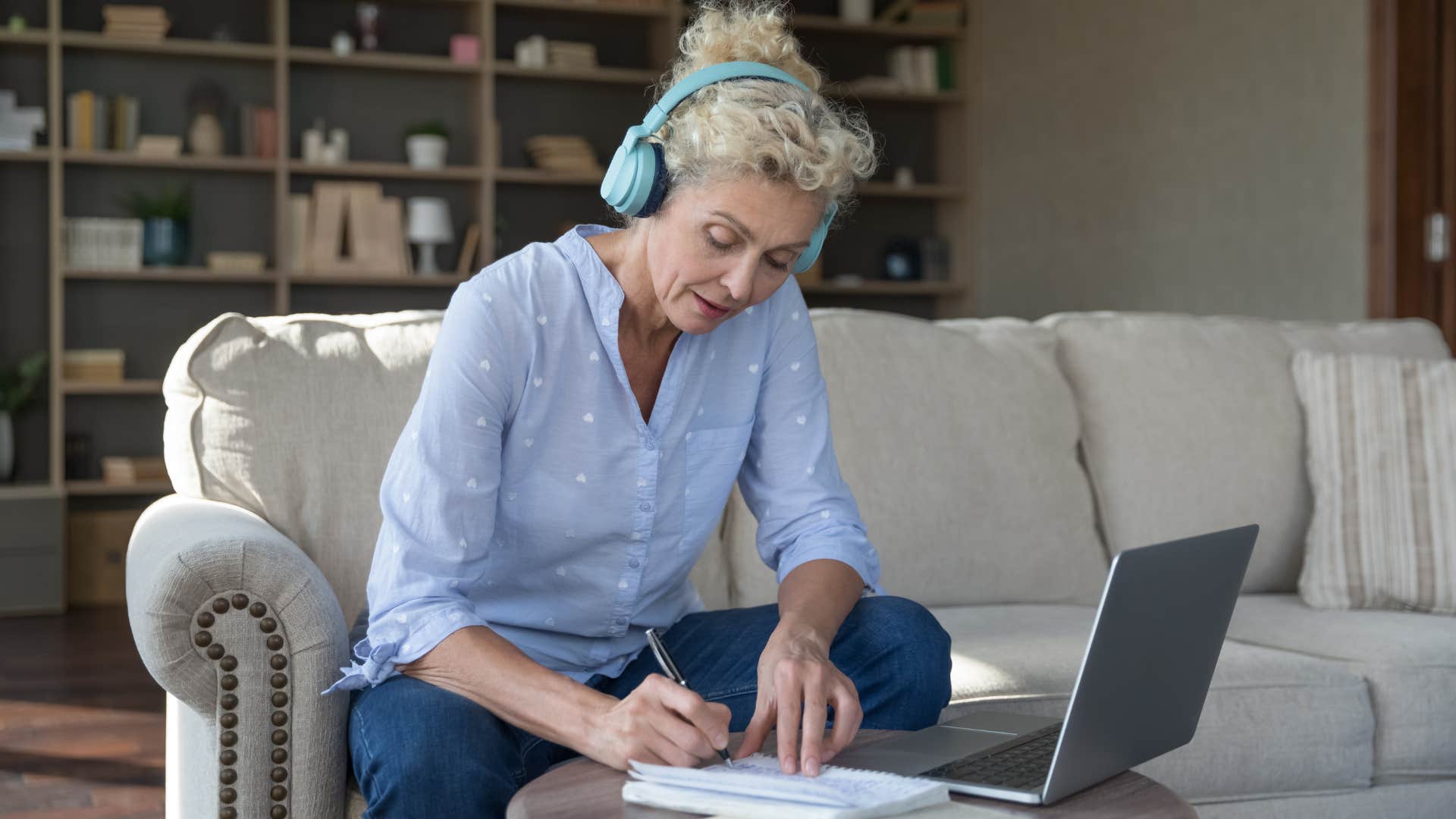 focused woman working on her laptop