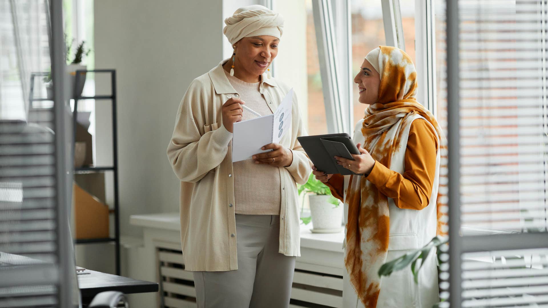 woman asking colleague if this makes sense