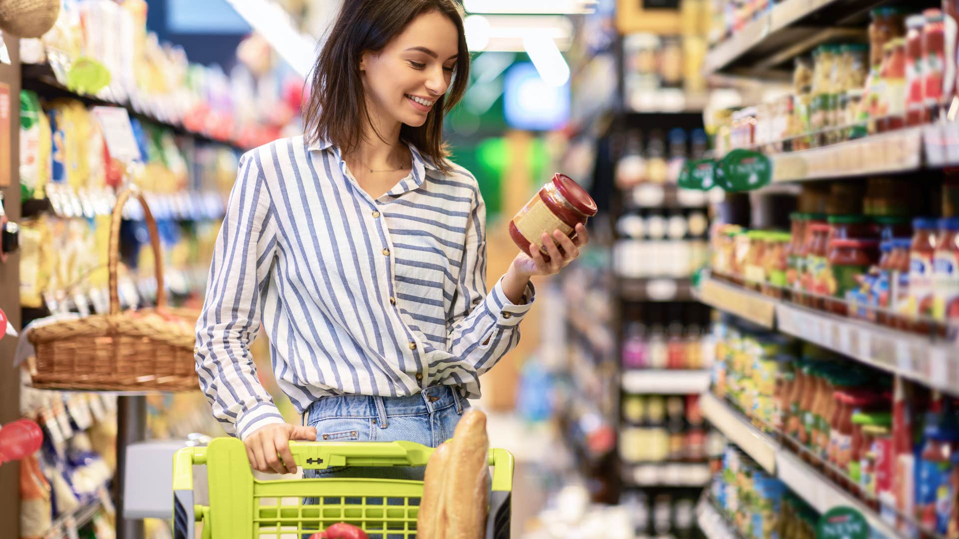 woman looking at a price and deciding it's too expensive