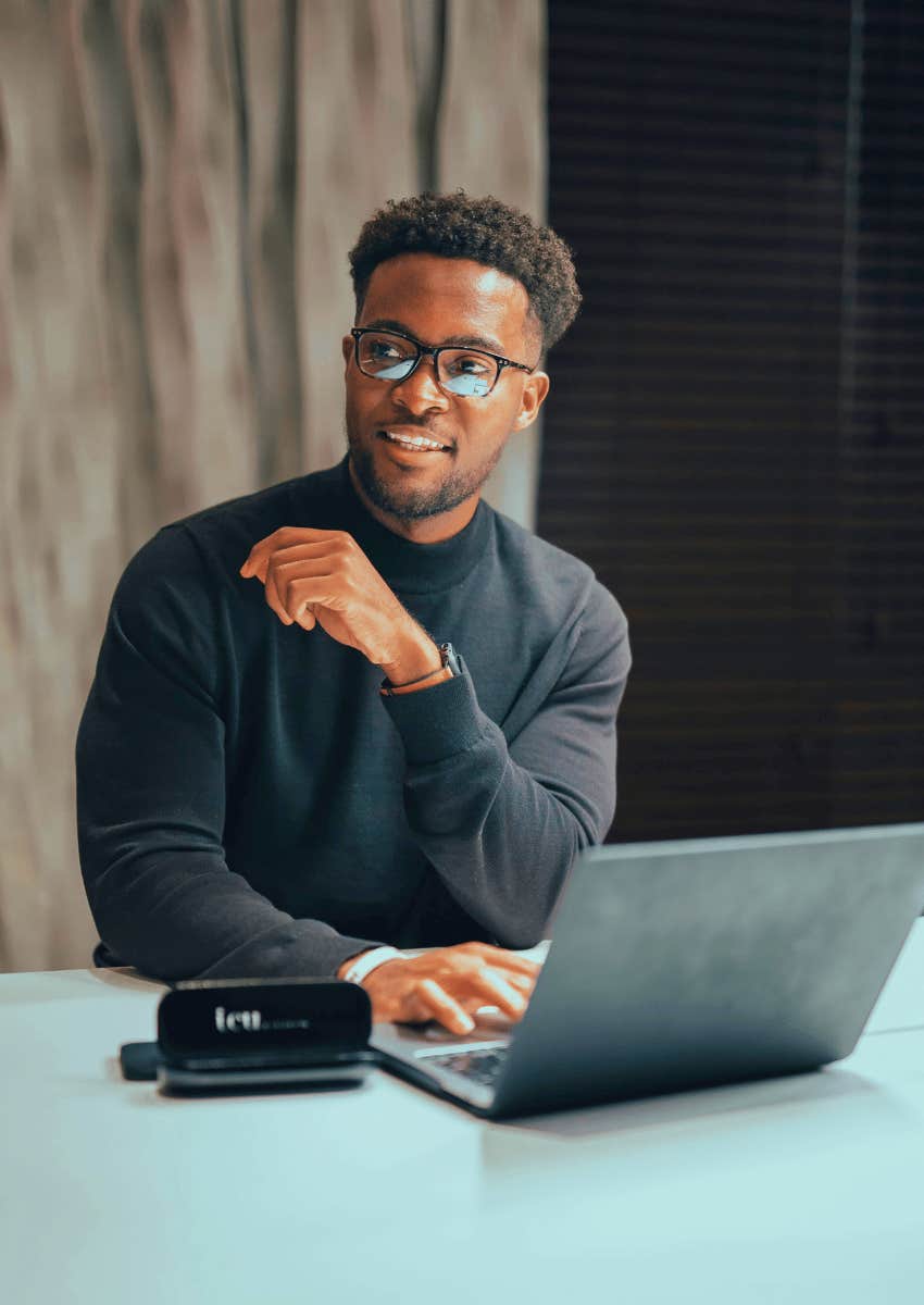 professional young man with an open laptop