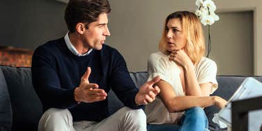 Most Common Reasons Men And Women Don't Get Each Other, According To Psychology Man and woman looking at each other puzzled, not understanding each other.