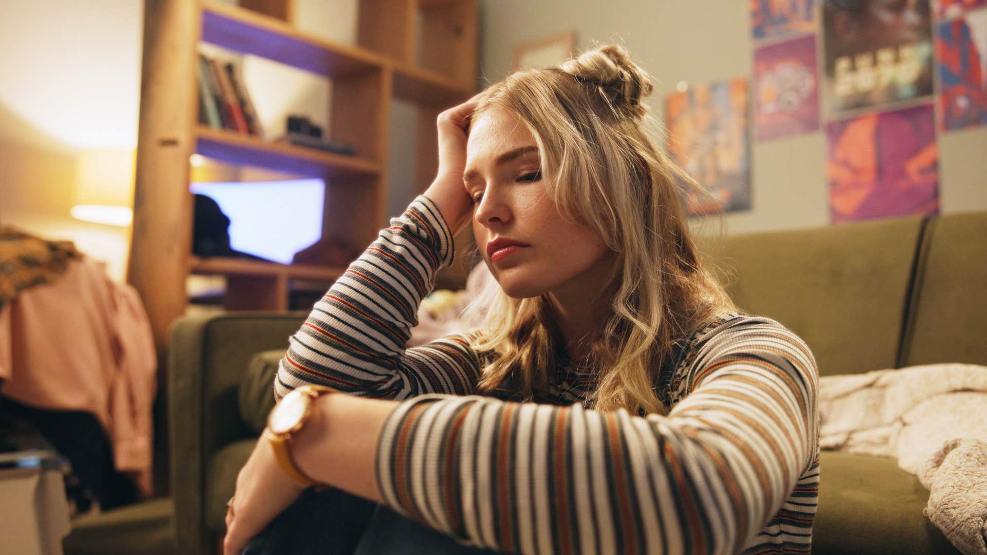 stressed woman looking upset can't afford to take time off from work