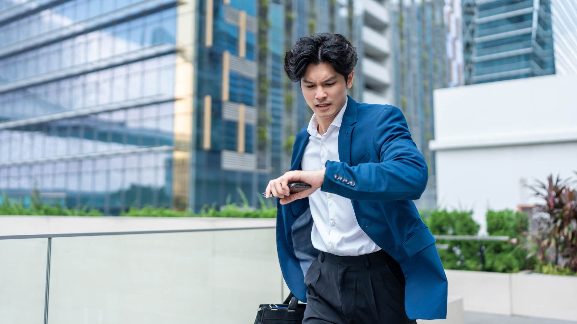 man hustling to job to stay afloat financially