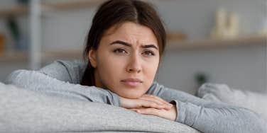 woman feeling uncomfortable due to her strong morals