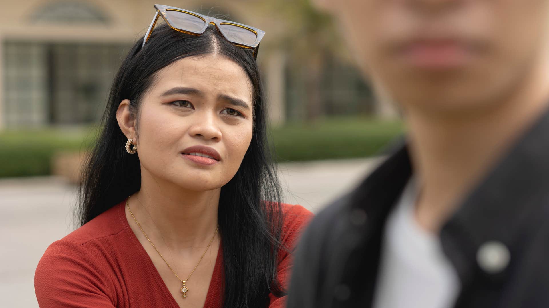 woman chasing man turned away from her