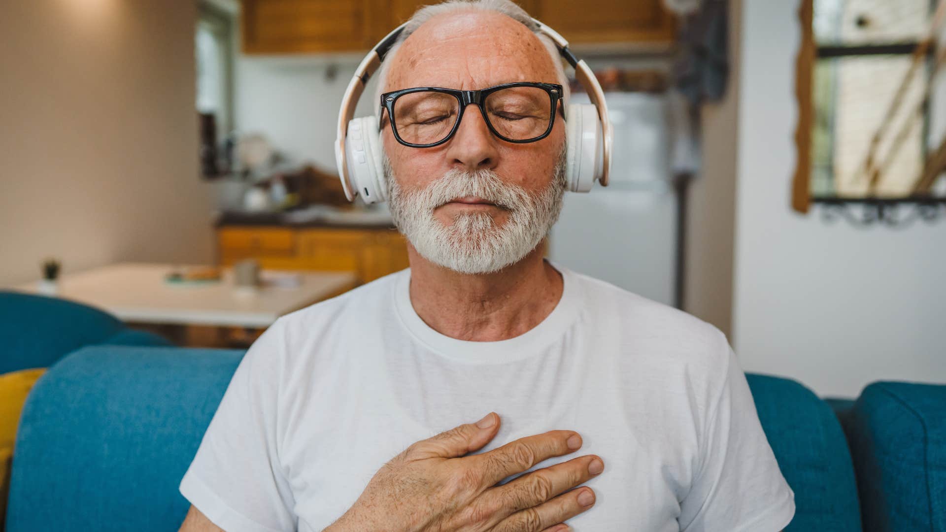 intelligent man smiling and sitting in silence