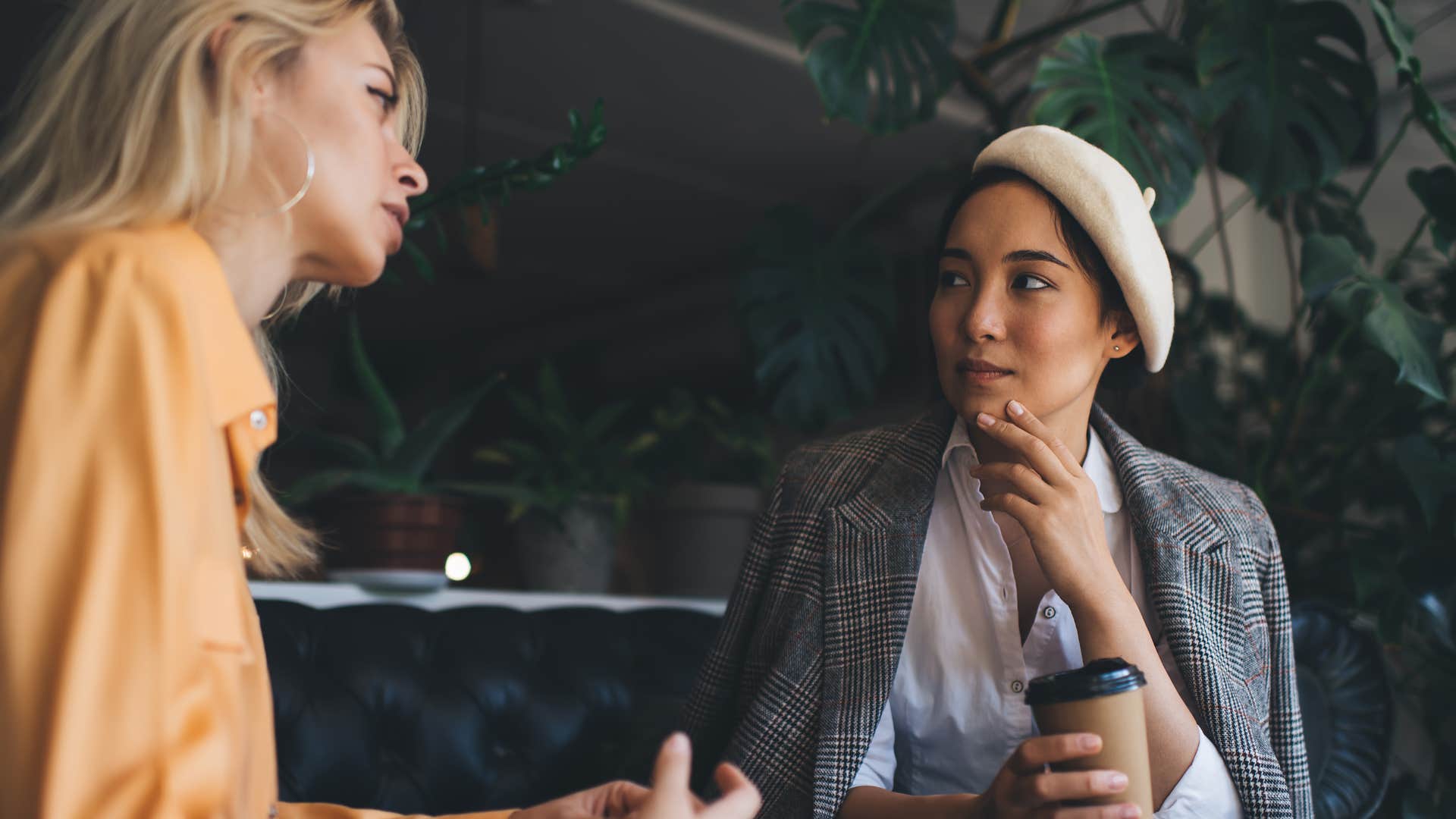 woman listening intently as she does her best to stay calm under pressure