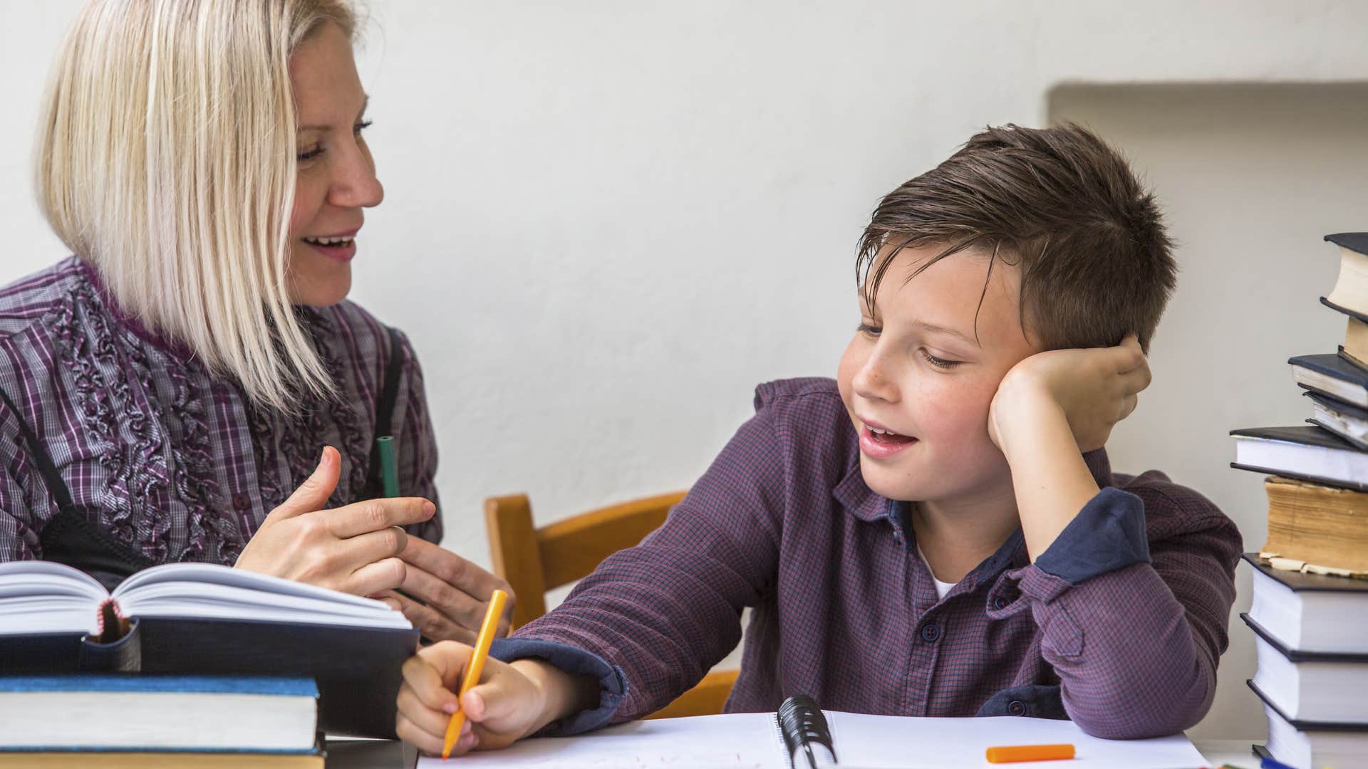 parent prioritizing kid by getting homework help
