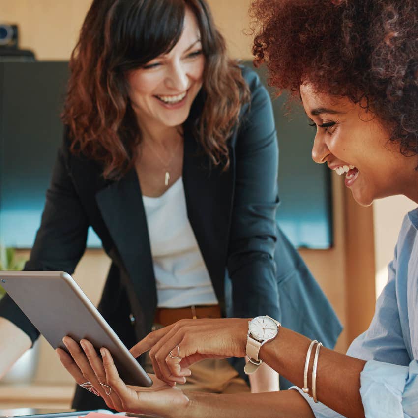 woman who is a respected leader with a happy employee